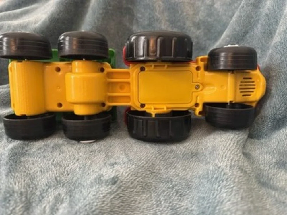 This 2007 Fisher-Price Little People Tow 'n Pull Tractor